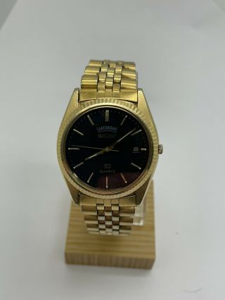 Vintage Seiko 5y23 - 8a69 Gold Toned Quartz With Fluted Bezel Day Date -