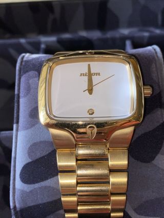 Nixon Player Watch In Gold With White Face And Real Diamond