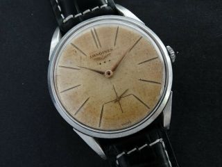 VTGE CLASSIC AND ELEGANT LONGINES 12.  68z TEXTURED DIAL MEN WATCH.  Ref 7111.  1959 3