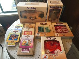 Bundle - Teddy Ruxpin & Grubby W/ Cord,  7 Talk Box Books W/tapes & 3 Outfits