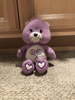 Care Bears - Share Bear Plush.  8”.  Purple With Lollipops