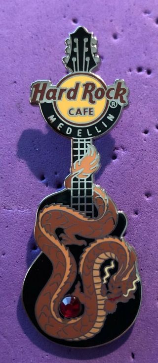 Hard Rock Cafe Medellin Black Guitar With Brown Colored Dragon / Stone Pin Le