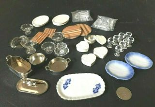 A Large Variety Of Dollhouse Miniature Kitchen Items