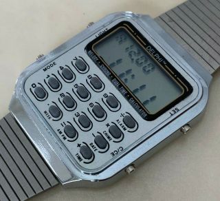 Vintage Delphi Men Melody Calculator Digital Quartz Watch Hour Batter