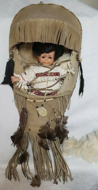 Native American Porcelain Cry Baby Doll Papoose Leather Cradleboard Wall Hanging