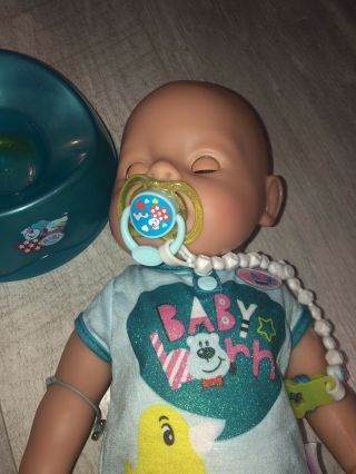 BABY BORN BOY DOLL WITH MAGIC EYES WITH POTTY PACIFIER BOTTLE WEES AND CRYS 2