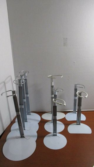 Set Of 9 White Metal Doll / Bear Adjustable Stands Various Sizes 4 " To 5.  5 " Base